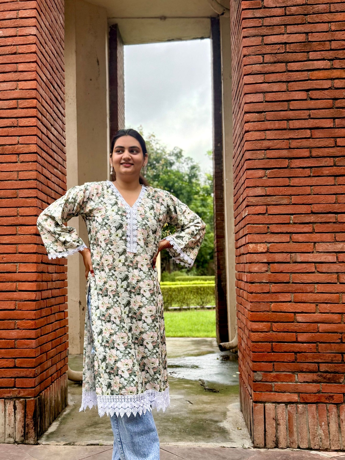 Floral Printed Green Long Kurti with Lace Detailing – Elegant Ethnic Wear for Women