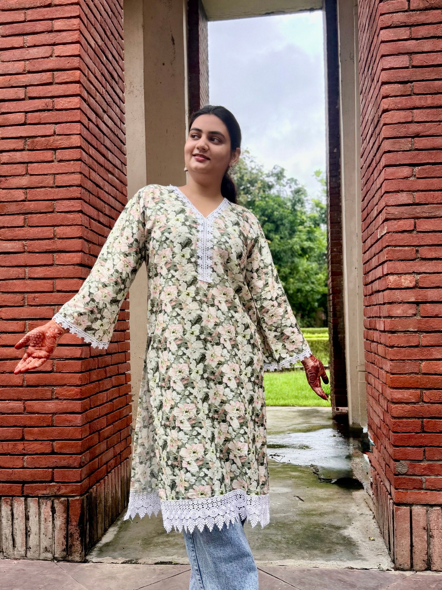 Floral Printed Green Long Kurti with Lace Detailing – Elegant Ethnic Wear for Women